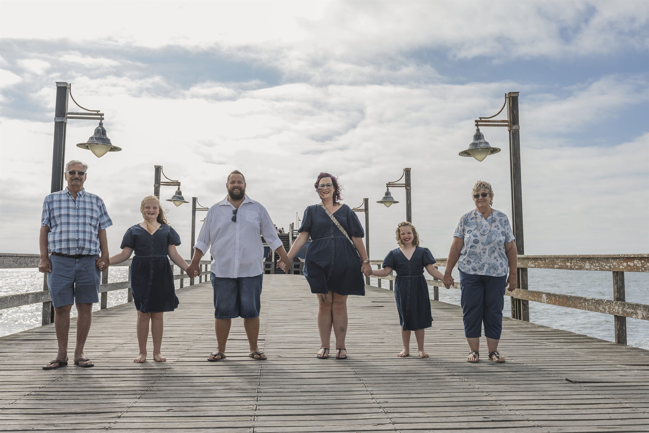 Tricia Burger family shoot at the Swakopmund Jetty and beach by Maja Carstens — photo 1 of 15